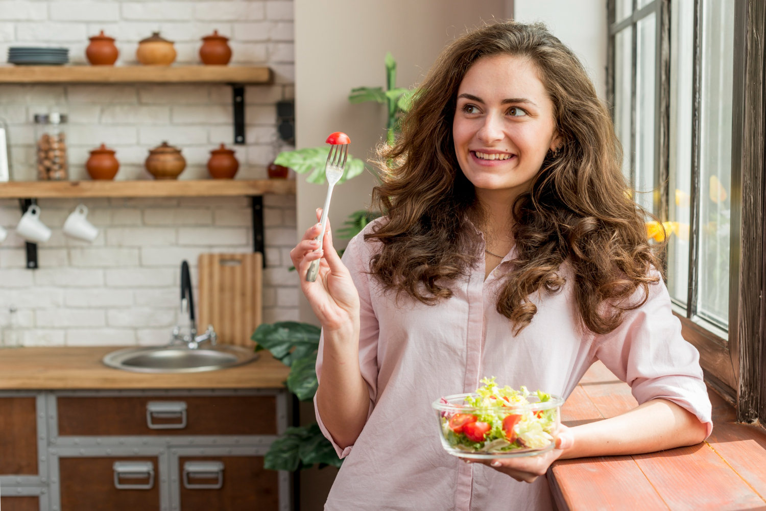 Girl with beatiful hair and healthy food