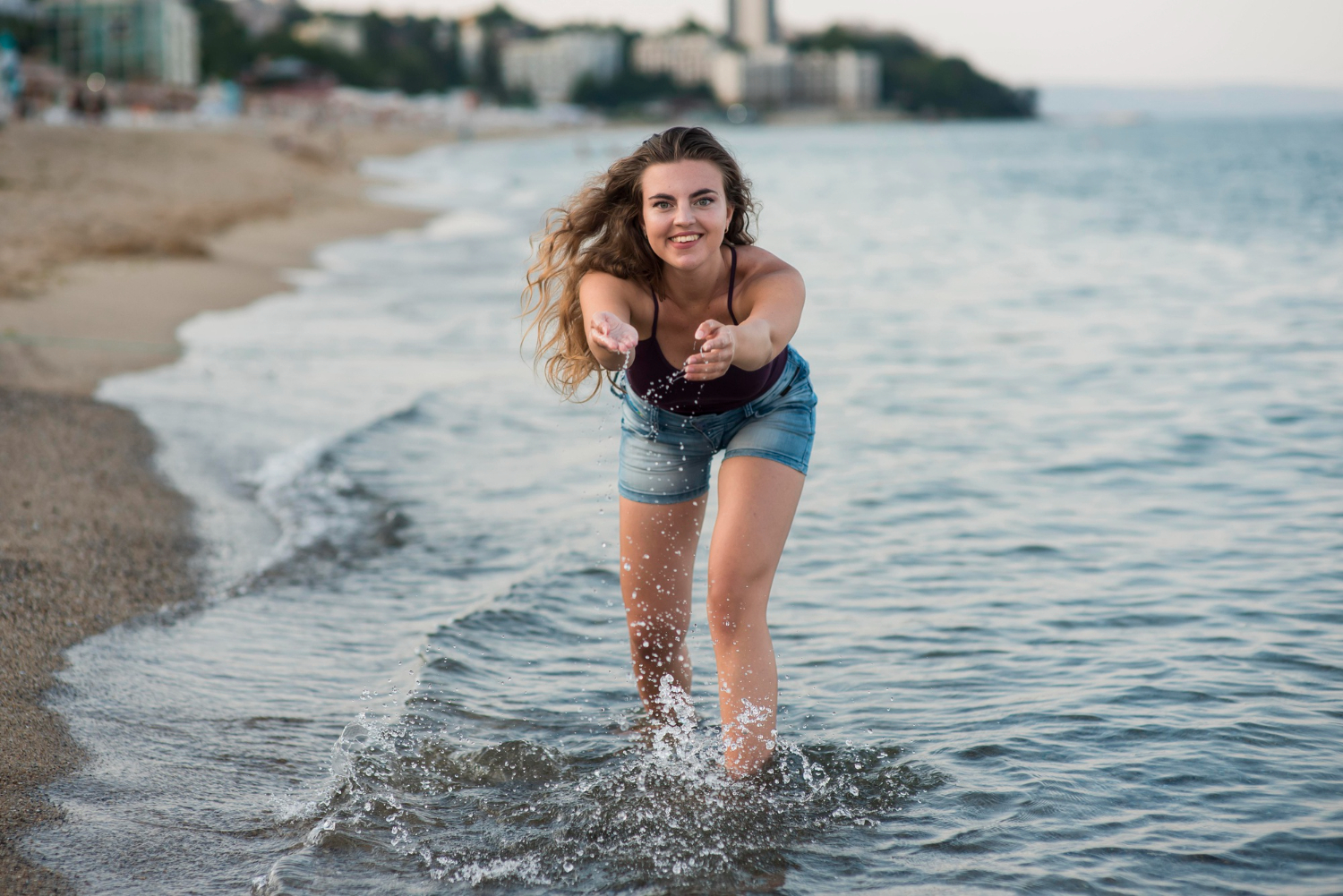 Girl stands in the sea